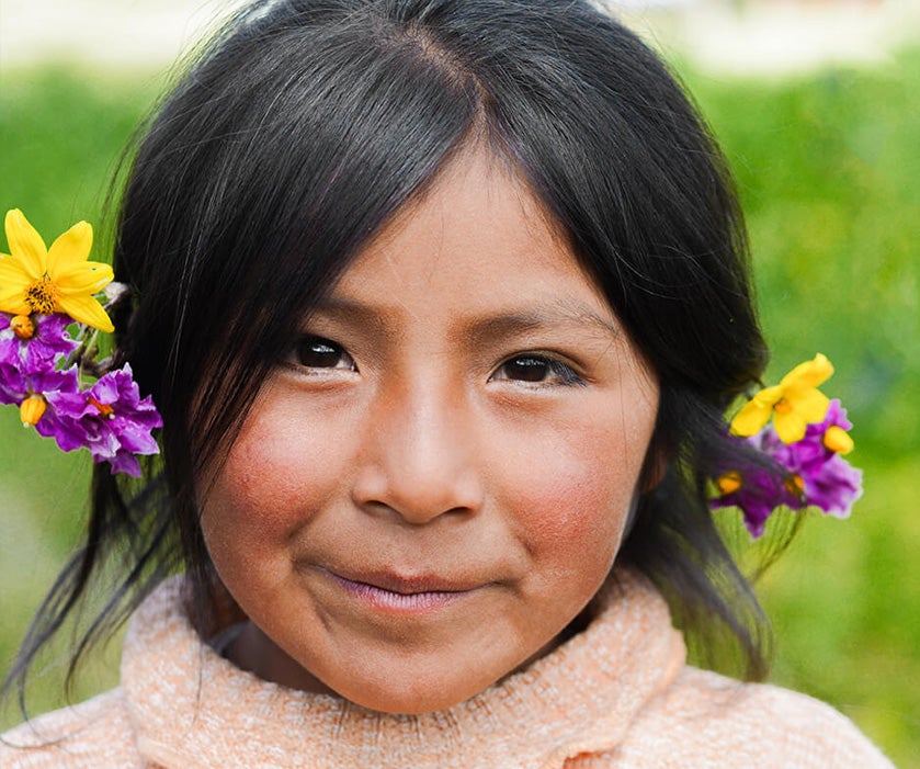 Image of a young native south american girl looking at cammera