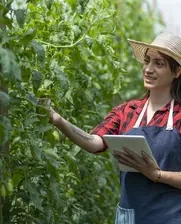 woman farmer in Colombian hat and ipad