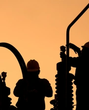 Image of energy station workers during an afternoon in Chile