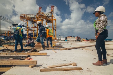 A woman oversees the construction of a major infrastructure project in Latin America