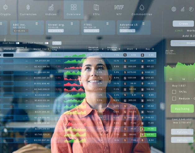 A woman looking at screens
