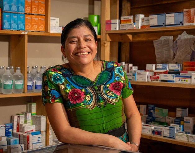 Carmen Eugenia Osorio at her pharmacy in colonia Las Flores, San Juan Sacatepéquez, Guatemala. 