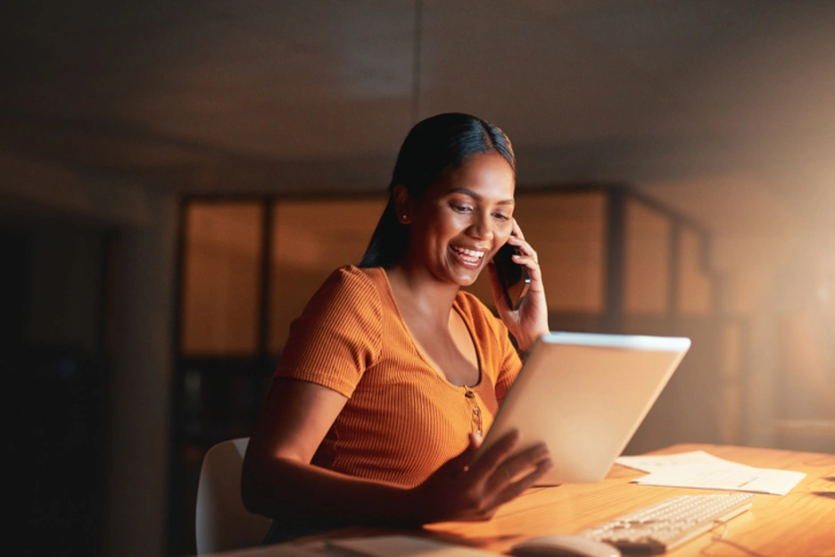 women business owner looking at a tablet