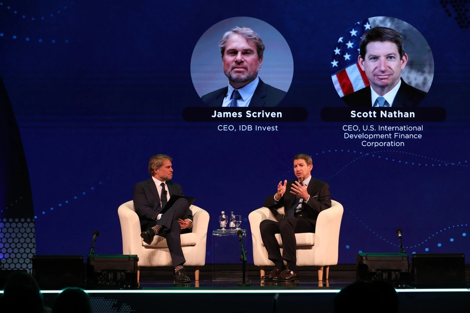 DFC CEO Scott Nathan, and IDB Invest CEO James Scriven talking at a panel