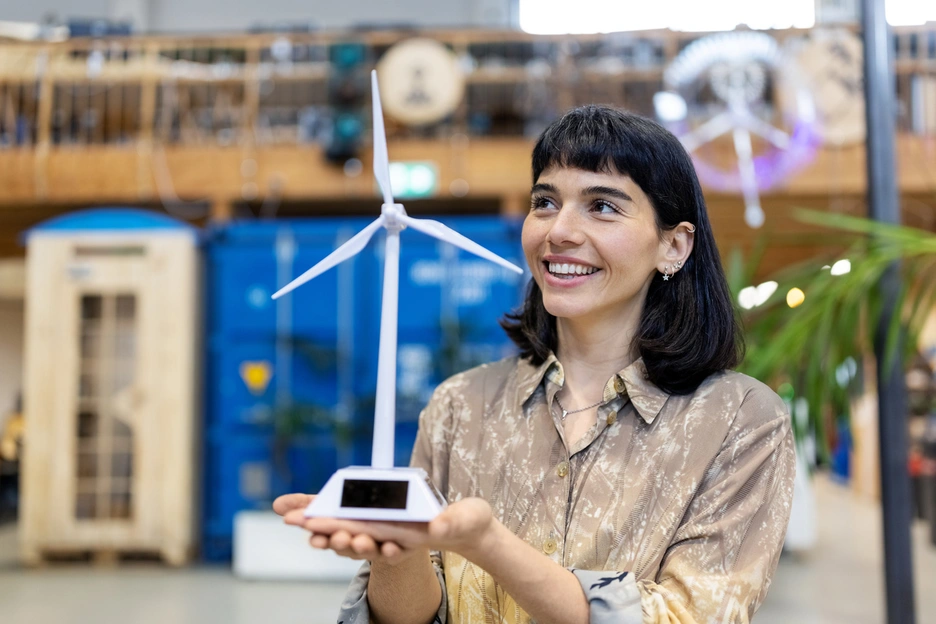 Woman holding a windmill