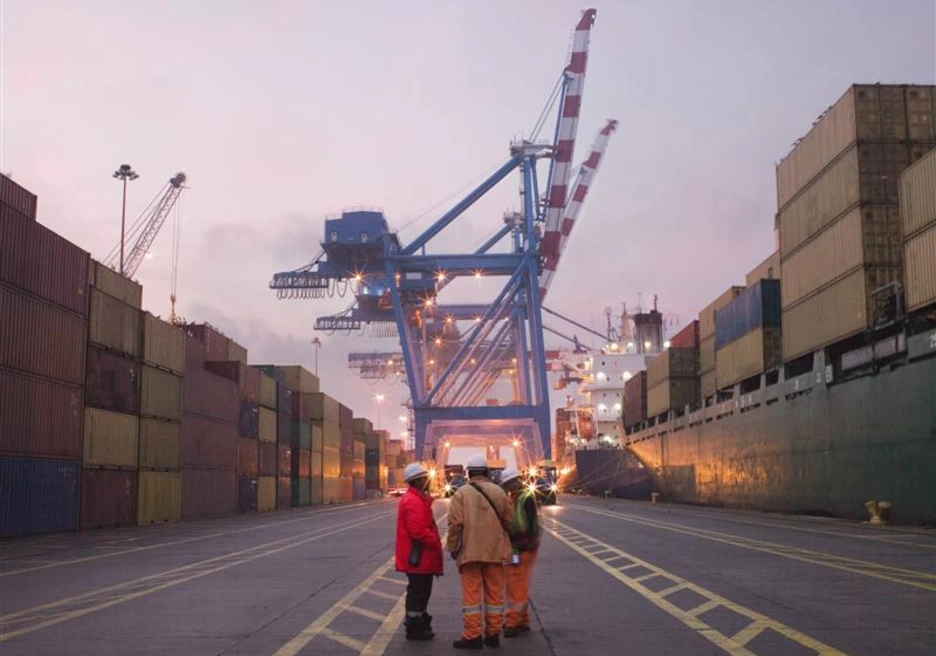 Workers in a port yard